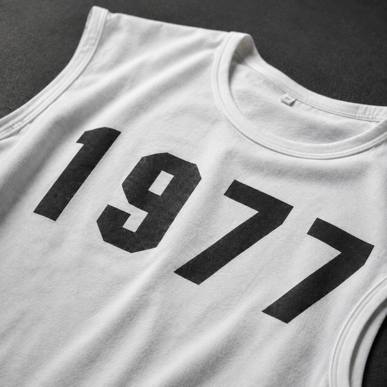 1977 Retro Oversized Sleeveless Graphic Tee – White